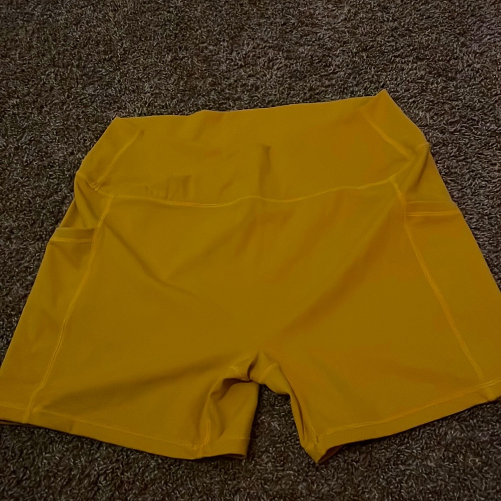 yellow cross band spandex shorts